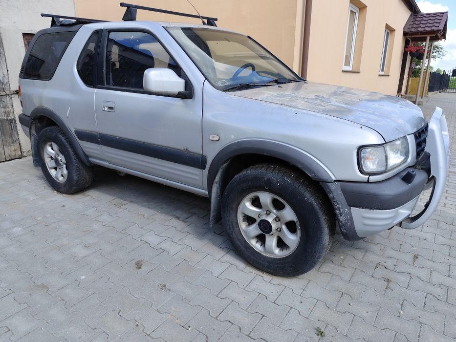 Części Opel Frontera B 2.2 Orurowanie Kangur Bumper lampy fotele