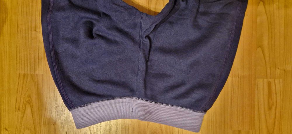 Ciepłe fioletowe spodnie dresowe Nike 152/158