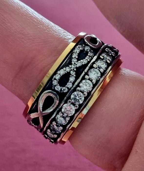 Anel bicolor, em aço, com zirconias e infinitos. Anti-stress. T17