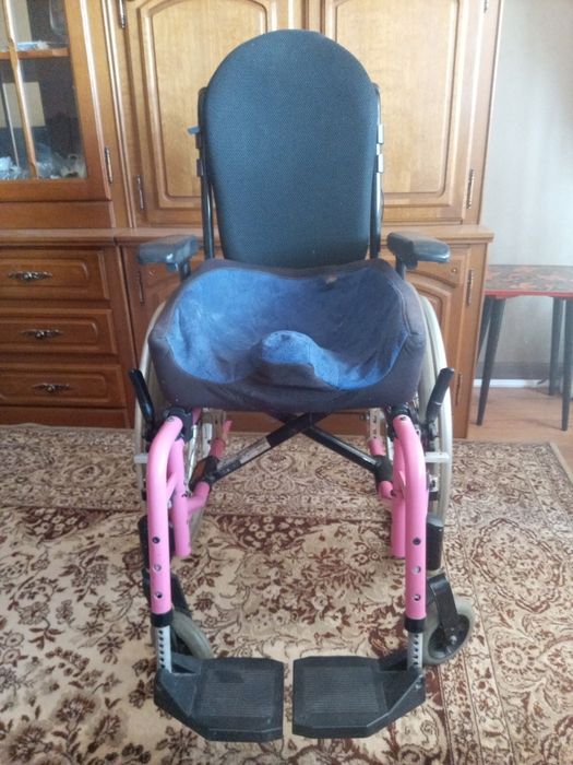 Детская инвалидная коляска