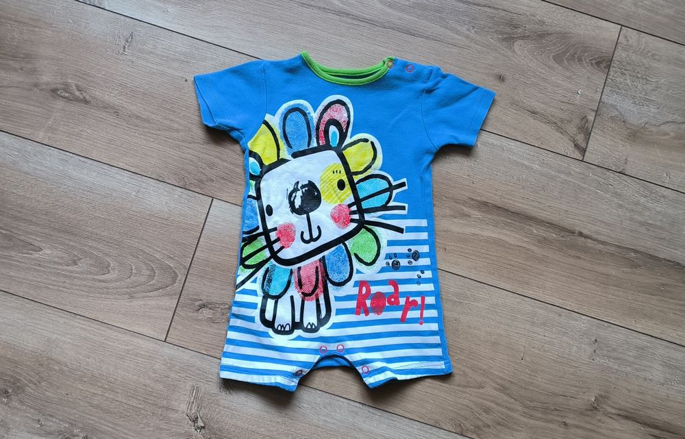 Pajac z krótkim rękawem 62cm lew
