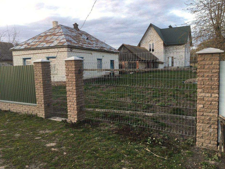Будинок з приватизованим великим участком в с. Салтикова Дівиця