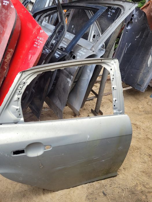 ford focus drzwi prawy tył  11-18 rok srebrne szare siwe