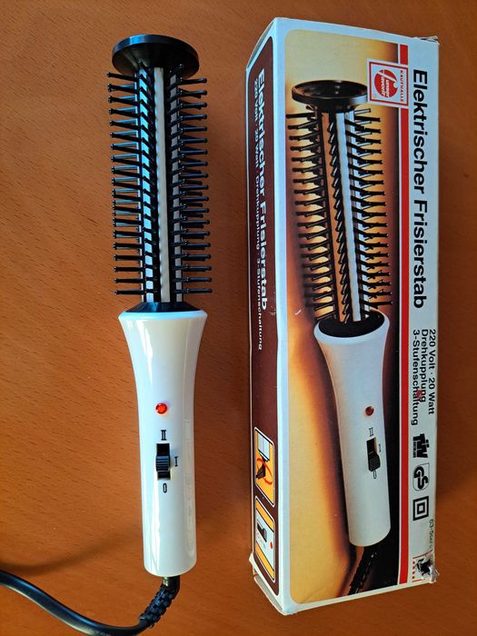 	Escova eléctrica de cabelo