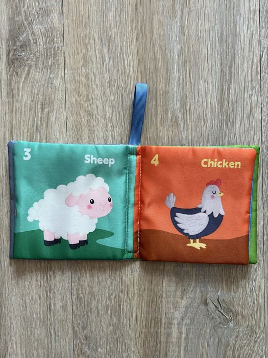 Книжка шуршалка  тваринки нова