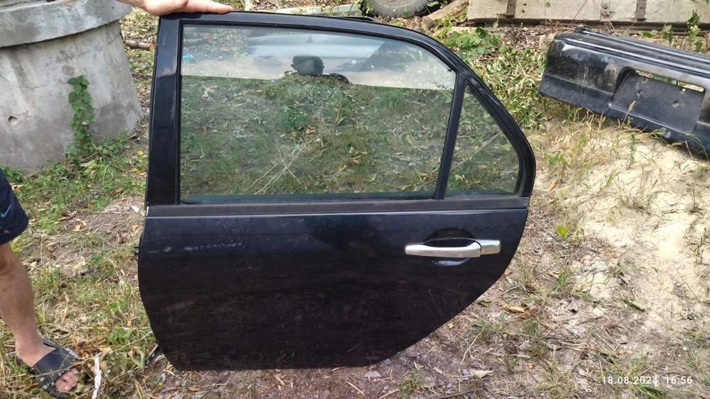 Двері на Mitsubishi lancer 9