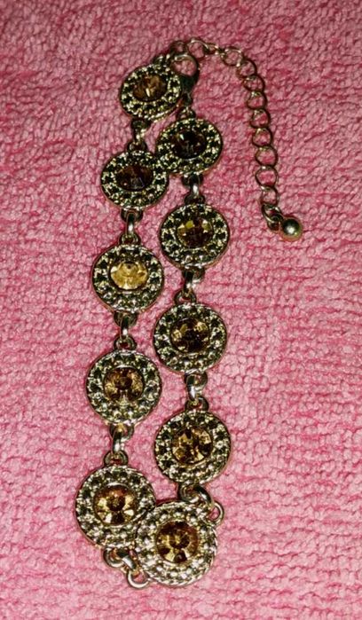 Pulseira antiga art déco, metal dourado e vidro âmbar facetado