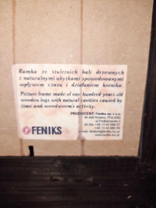 Obraz w ramce ze stuletnich bali