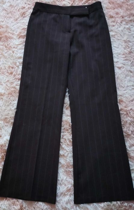 Eleganckie brązowe spodnie w idealnym stanie