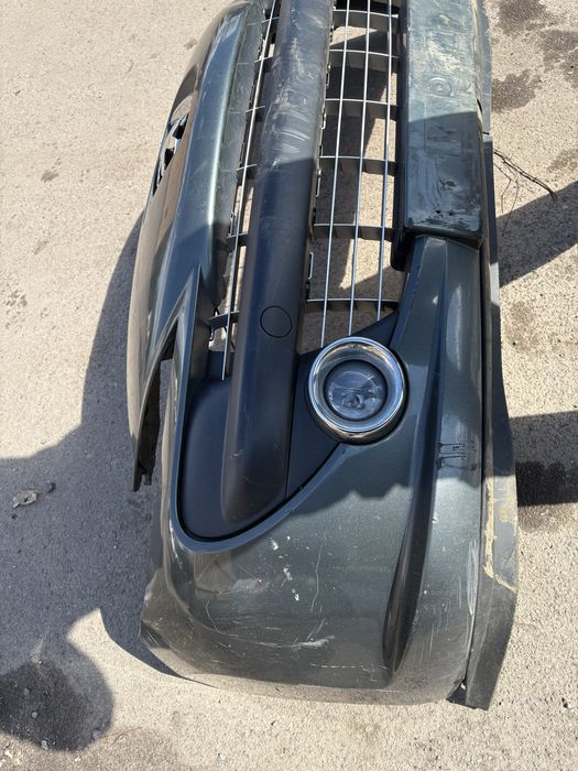 Бампер передній Peugeot 207