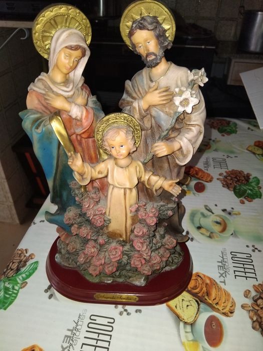 Sagrada família e queimador de velas