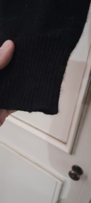 Casaco preto de la com pelo e missangas