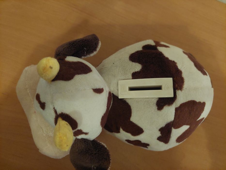 Корова и корова-копилка.