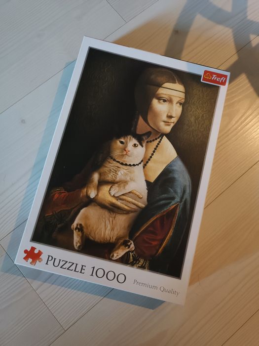 Puzzle Trefl 1000 dama z kotem
