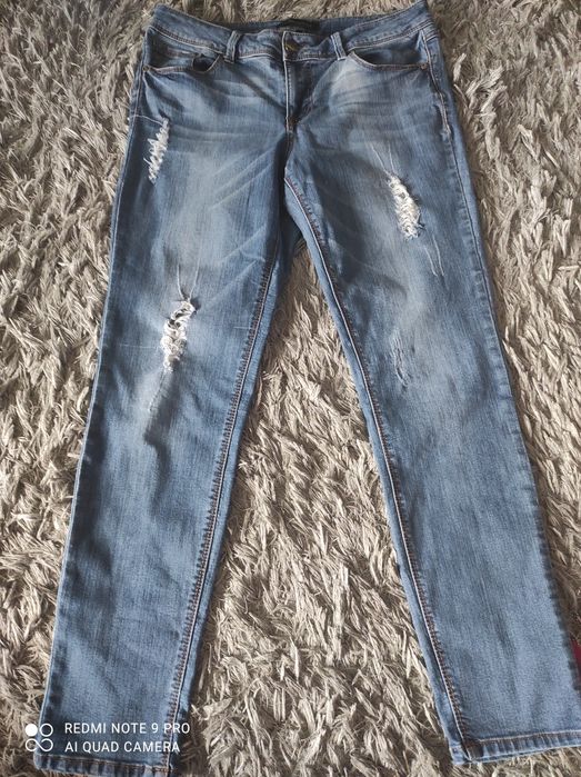 Spodnie dżinsowe " porwane"