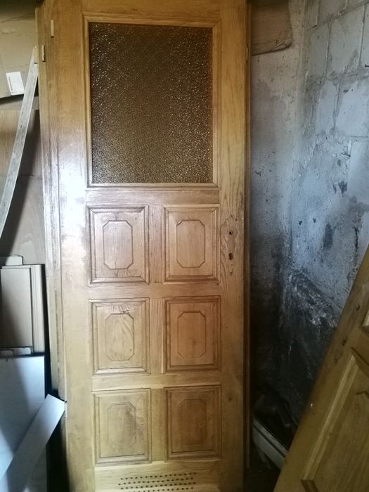Drzwi debowe przeszklone i pelne