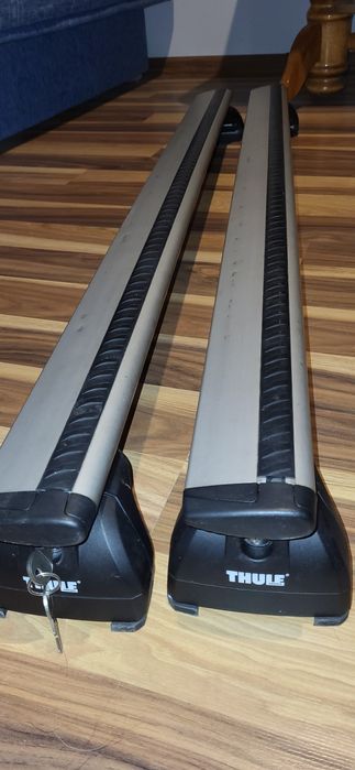 Bagaznik dachowy Thule komplet (Astra J kombi - relingi zintegrowane)