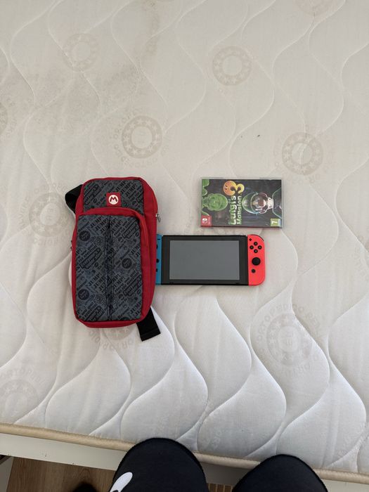 Nintendo Switch com bolsa + 1 jogo