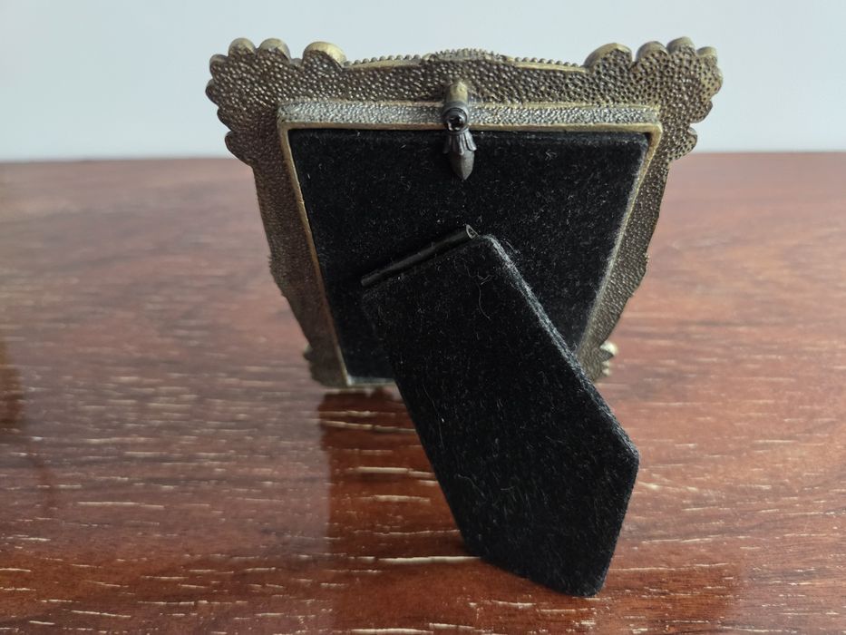 Moldura de mesa vintage em metal