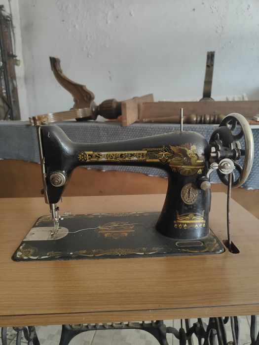 Máquina de costura singer