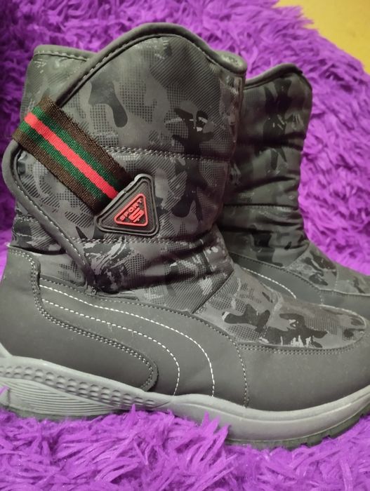 Зимові чоботи на хлопчика