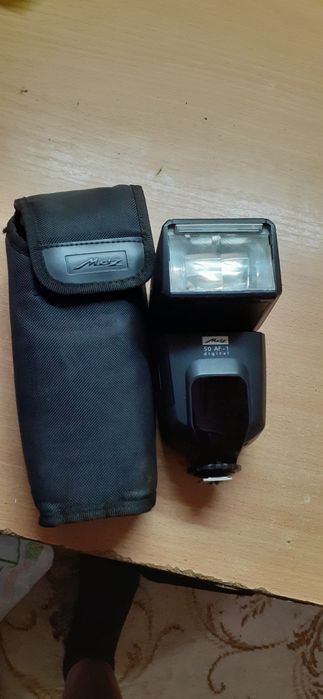 Вспышка Metz-50-1 для Canon