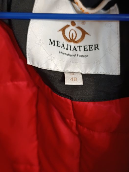 Жіноча зимова куртка 48 розміру