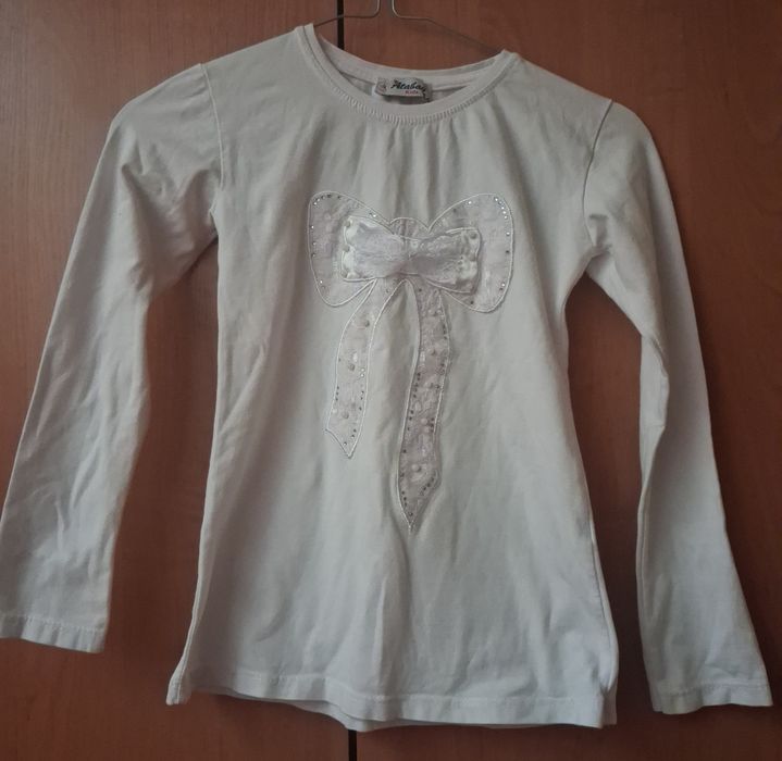 Кофточки на дівчинку  8-9  років