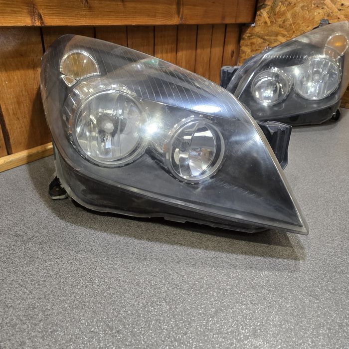 Фари передні Opel Astra H, Орель Астра Н 1EG27037001 1EG27037002