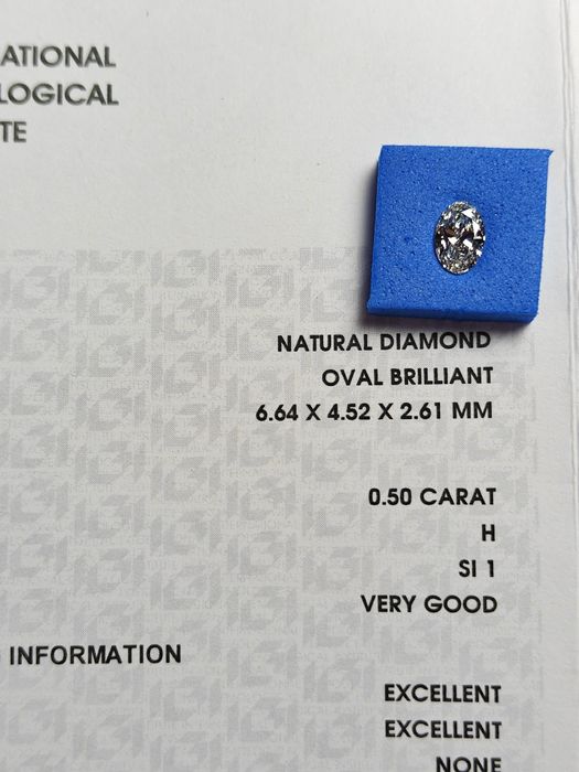 Diament naturalny 0,5ct owal H / SI1 brylant certyfikat IGI inskrypcja laserowa na rondyście