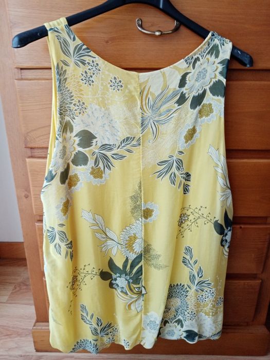 Blusa amarela como nova