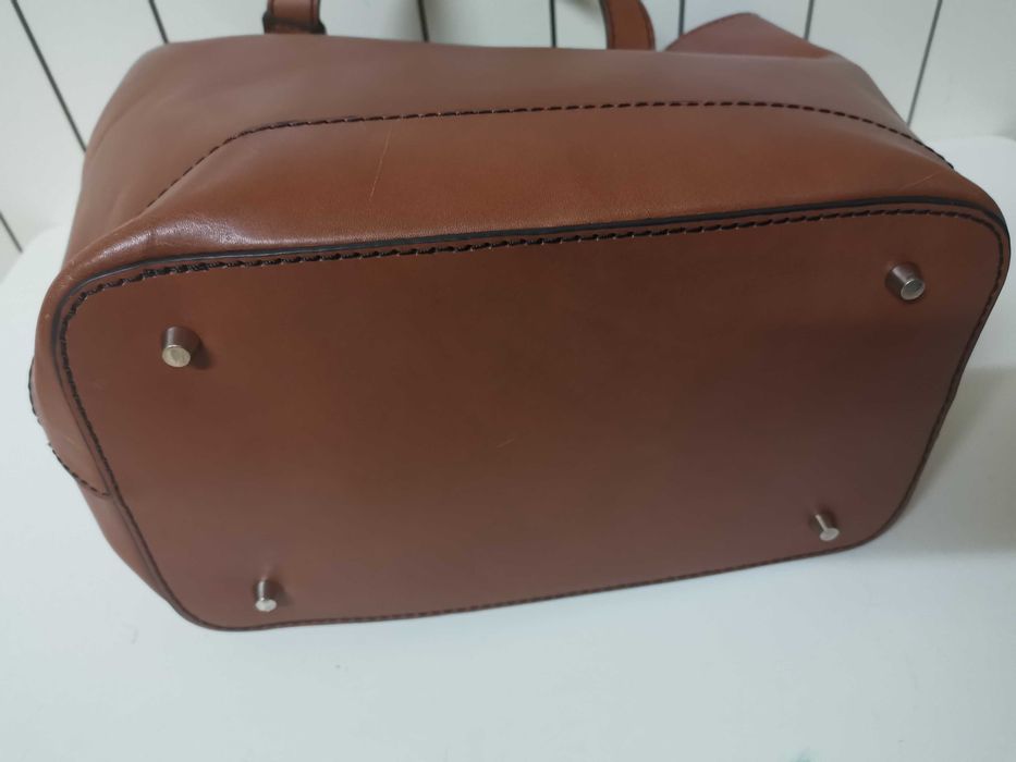 Mala em pele marca Caroll como nova