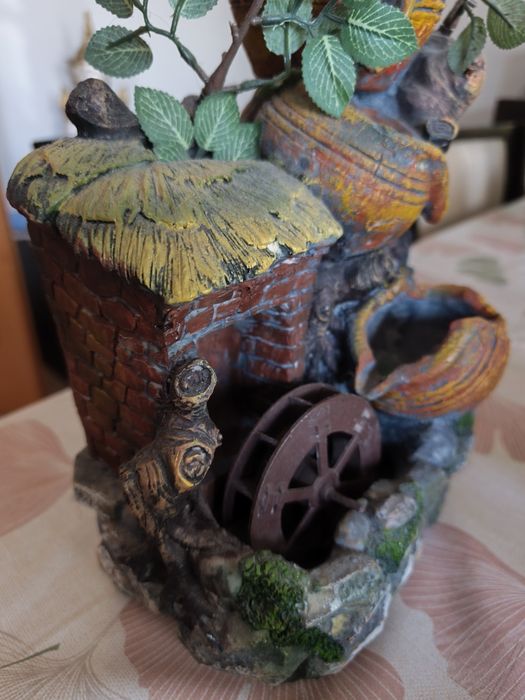 Fonte decorativa elétrica com água