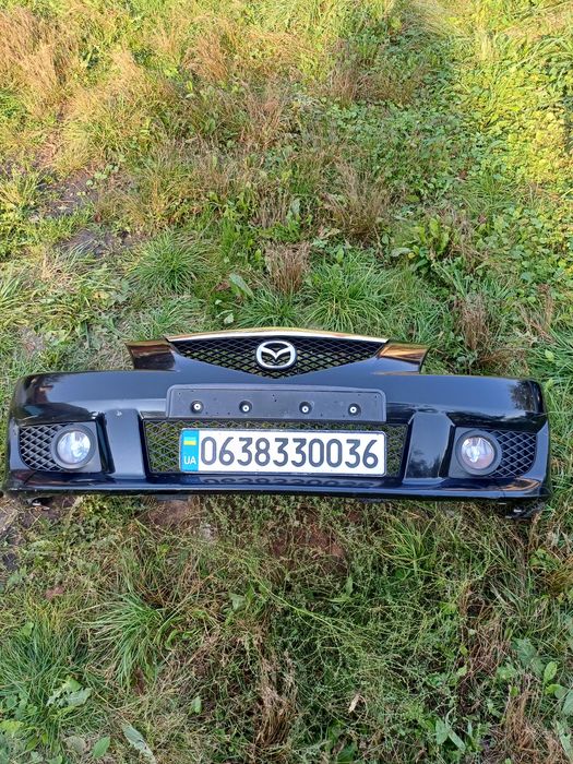 Mazda Premacy передній бампер взборі як на фото