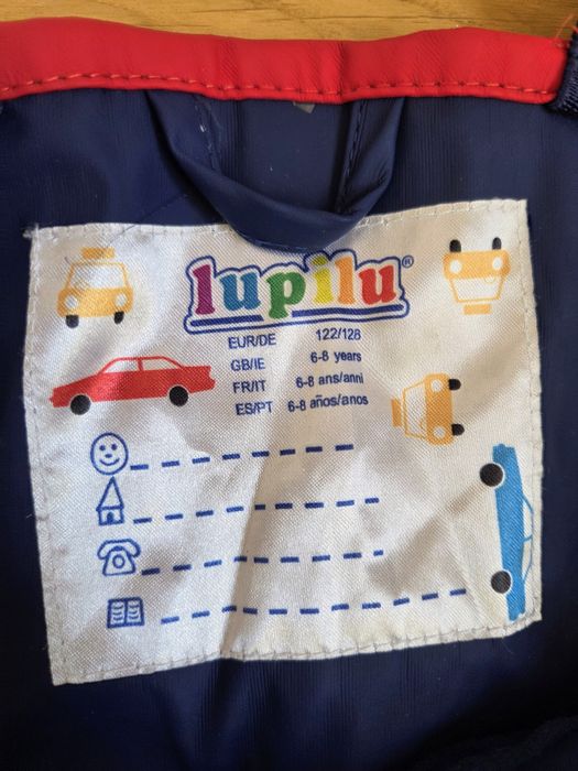 Spodnie przeciwdeszczowe 122-128 Lupilu super stan