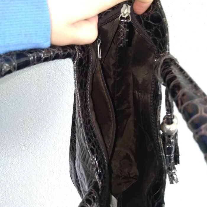 Mala preta padrão cobra