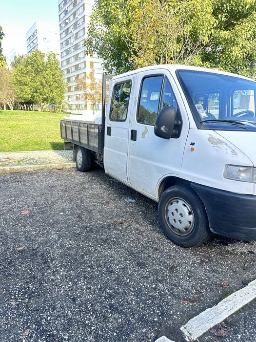 Carrinha se caixa aberta e 7 lugares impecavel