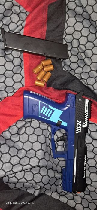 Pistolet zabawkowy, wyskakujące łuski