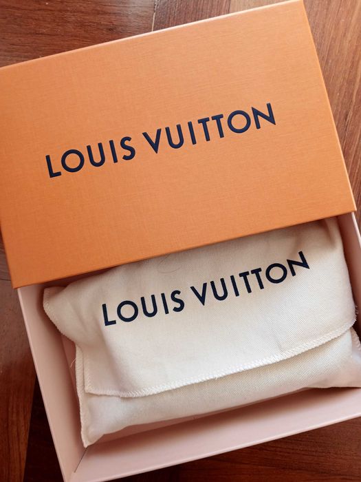 Pochette Louis Vuitton autêntica com talão de compra