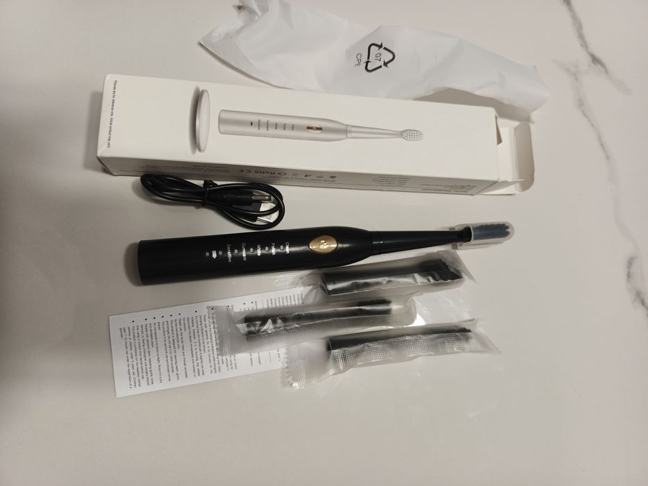 Електрична зубна щітка