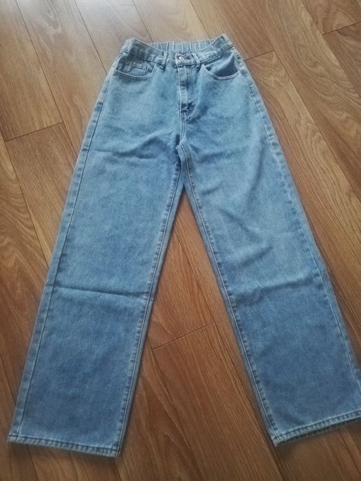 Nowe z metką spodnie szerokie nogawki