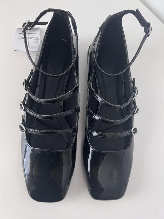 Sabrinas tiras fivelas