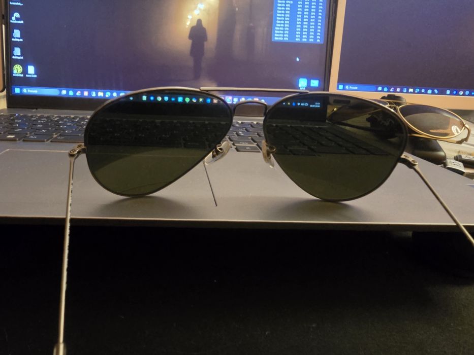 Oculos de sol ray ban lente prateada