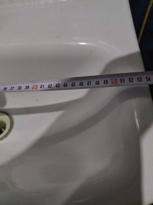 Умивальник у ванну