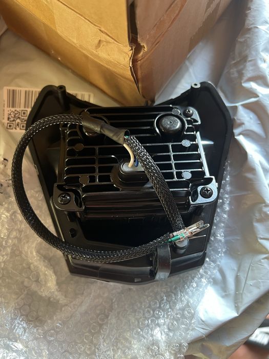 Farol de moto com ligação