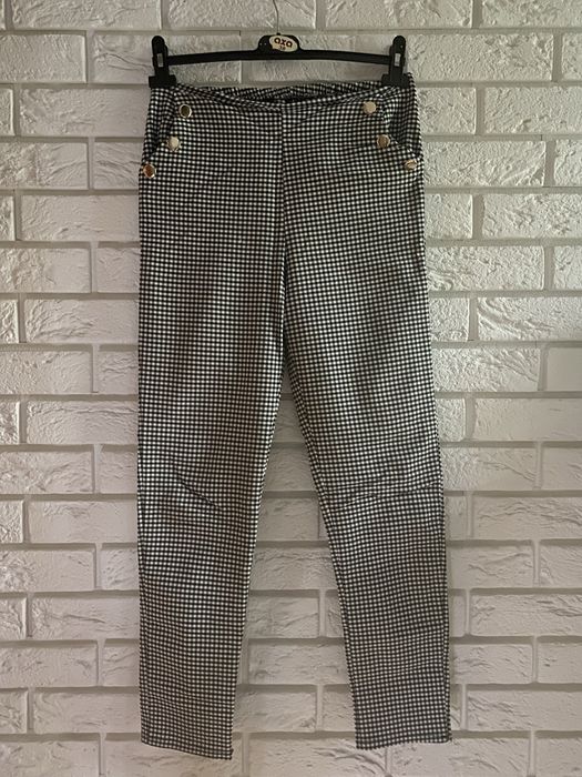 Eleganckie spodnie czarno-białe w kratkę