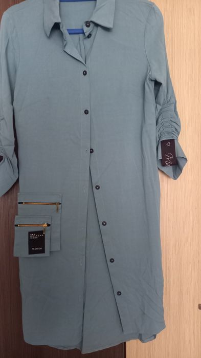 Szmizjerka sukienka w kolorze turkusowym Malecka