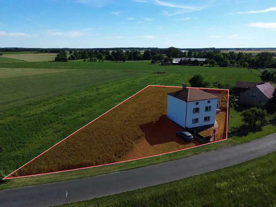 Dom z budynkiem gospodarczym i dużą działką 1985 m²