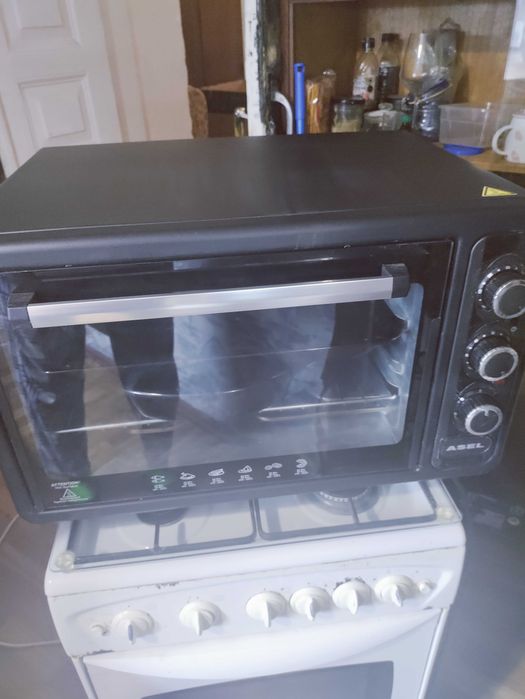 Продам газовую плиту вместе с электродуховкой