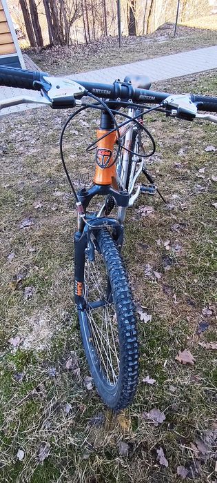 Rower srebrno-pomarańczowy  KTM
